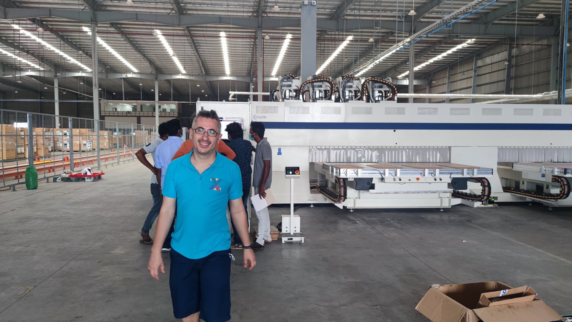 CNC woodworking machining centre running in an industrial workshop